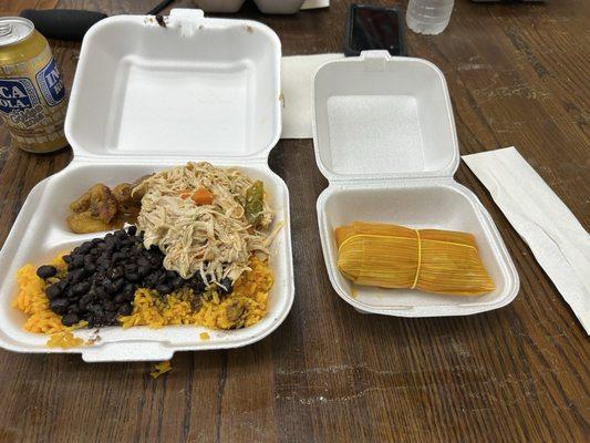 Chicken, pork tamale, yellow rice, black beans and plantains