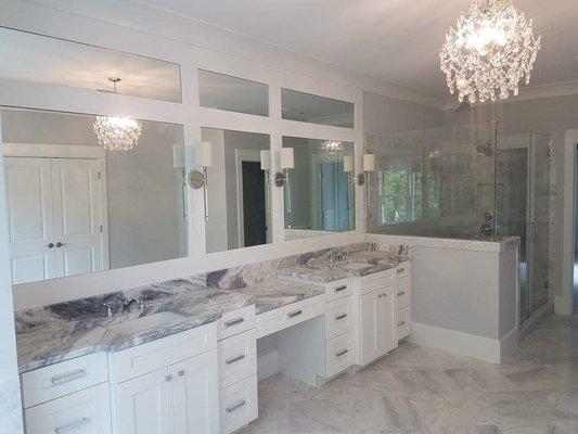 Custom mirrors and custom shower enclosure!