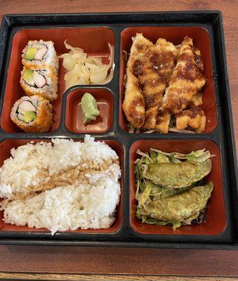 Bento Box Lunch: Vegetable Gyoza, Chicken Katsu, California Roll, Rice.