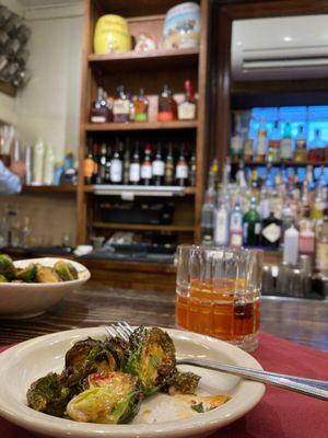 Brussel sprout appetizer with a smoked old fashioned