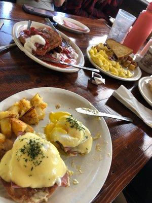 Eggs Benedict, strawberry French toast, basic breakfast.