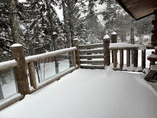 Fresh fallen snow on the lodge deck!!