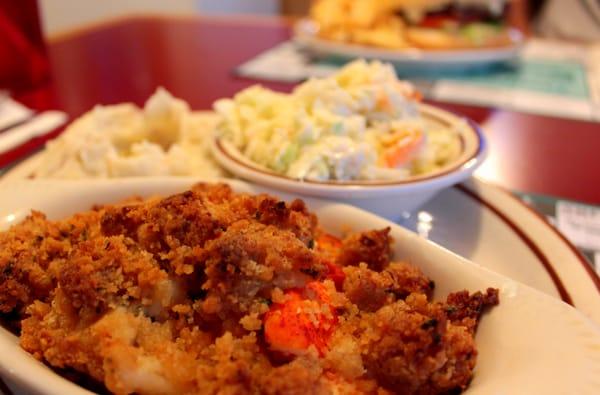 Clever plating with a decent share of melted butter pooled in the mashed potatoes, that lobster saw every bit of it.