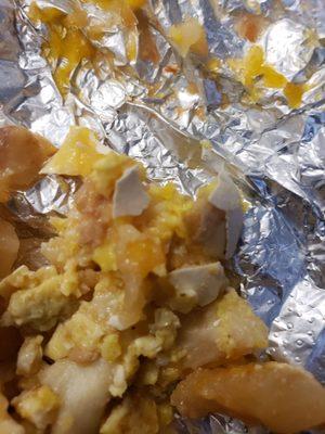 Egg shell in breakfast burritos