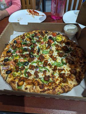 Butter Chicken and another Chicken Pizza with the same Butter Chicken Base