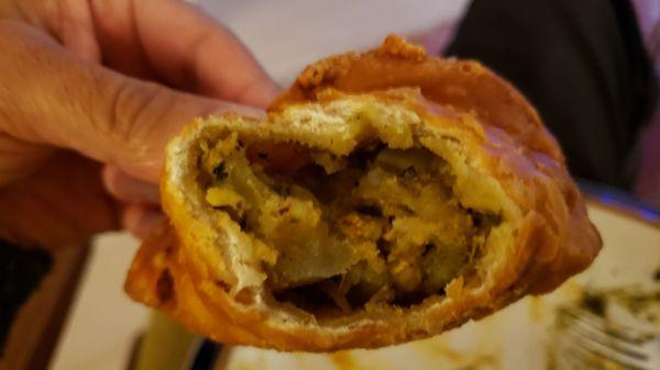 Interior of vegetable samosa ($5). Filling was slightly charred and excessively minty.