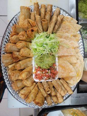 Party plater rolls taquitos, mini chimichangas, quesadillas & condiments