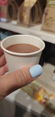 Hot chocolate made with almond milk with cinnamon and nutmeg. Beans are roasted and ground on the premises.