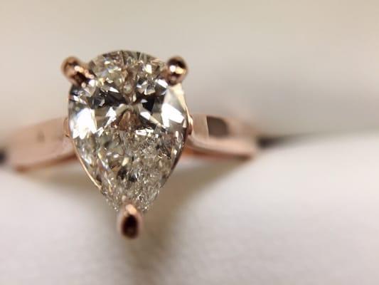 Pear shaped diamond and rose gold setting