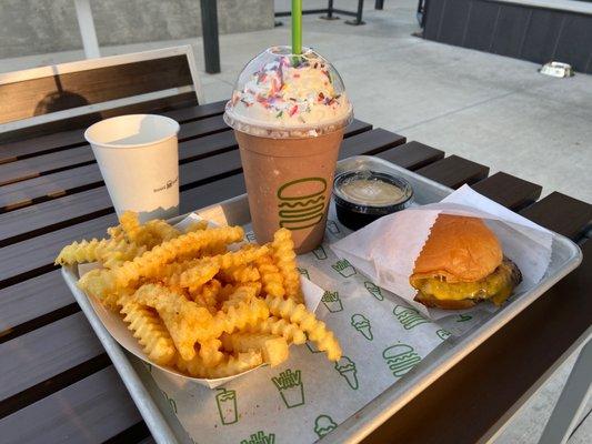 cheeseburger, fries, and milkbar chocolate cake shake