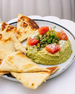 Our Avocado Hummus comes with salty pistachios and tangy grapefruit.