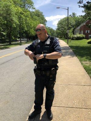 Officer Fromm, keeping the community safe from errant leafletters.