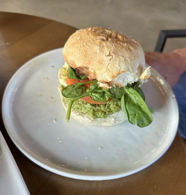 Goat cheese, spinach sandwich. Homemade pesto, goat cheese, fresh spinach, tomato and egg on homemade ciabatta