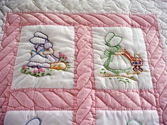 Amish Baby Quilt - pattern is Sunbonnet Sue.