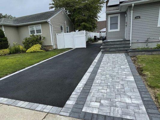 Beautiful Driveway. Walkway. Steps. & Retainer Wall.