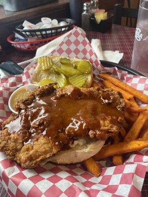 Nashville chicken sandwich with sweet potato fries