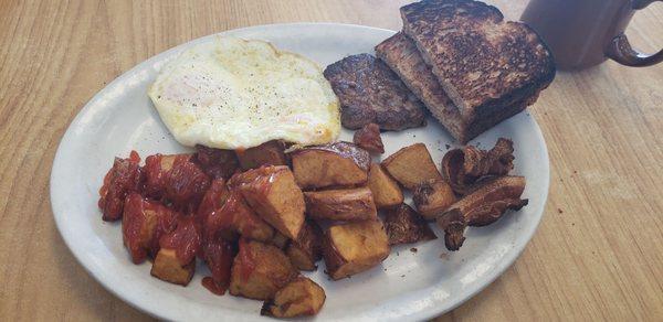 2 eggs over medium w/sausage patty and bacon, wheat toast, potatoes and Coffee!