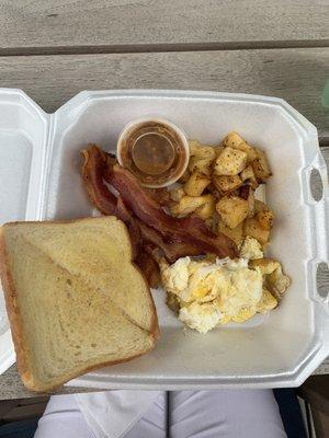 Eggs, bacon potatoes and toast