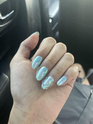 Blue chrome nails with rhinestones