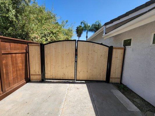 Double gate custom . 
Metal frame with tongue and groove Boards .. 
Encinitas CA 4/22