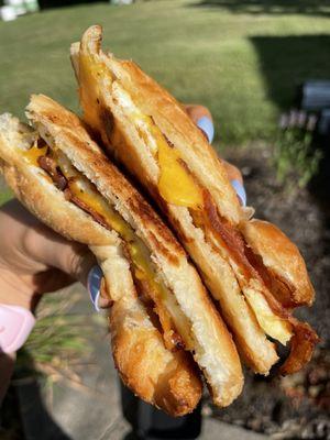 Croissant with bacon, egg, and cheese