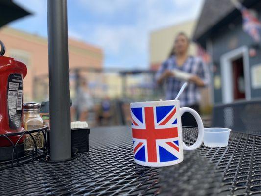 the Union Jack mug makes the place British I guess.