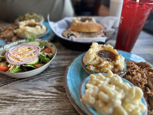 Pulled pork bbq, Mac n cheese, mashed potatoes, salad