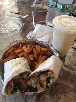 Chicken with spinach and mozzarella wrap with sweet potato fries and a pina colada smoothie