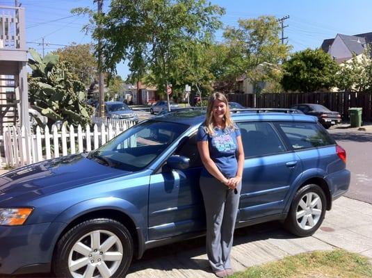 A happy customer with her new used car!