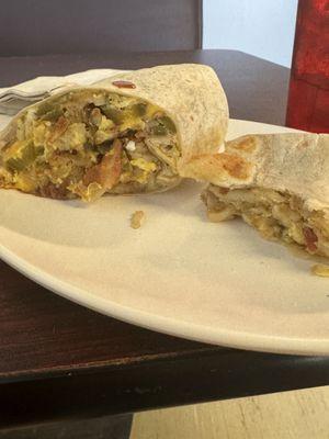 Breakfast burrito. Forgot to take a picture before I demolished half of it.