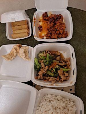 Generals chicken, broccoli chicken, eggrolls, potstickers, steamed rice