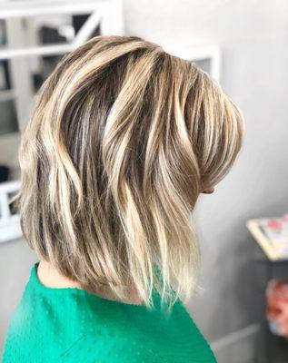 Grey coverage with blonde highlights