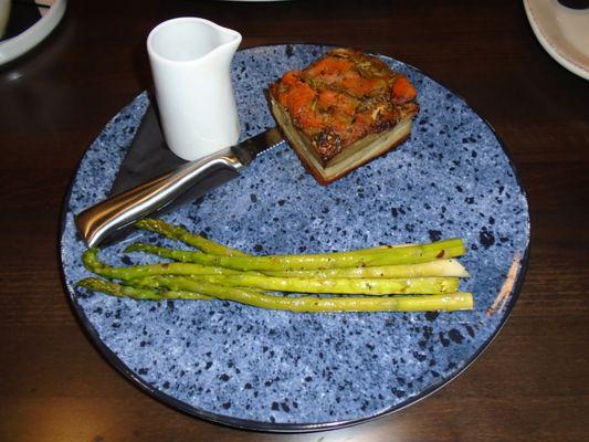 Pork Belly with balsamic reduction and asparagus.