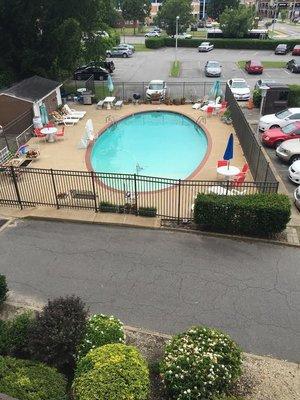 Completely fenced in-ground swimming pool, with gas and charcoal grills.