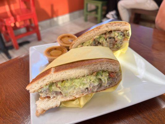 Carne asada torta w/ everything on it - a bit too wet for me on the inside