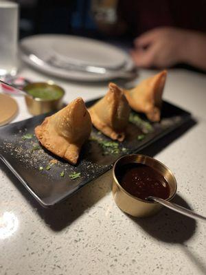 Veggie samosa with red and green chutney