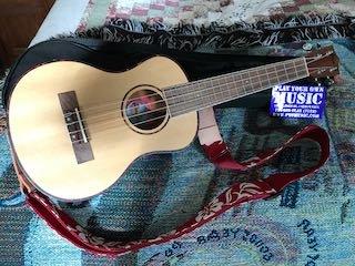 My new Amahi Soprano Ukulele with strap attached.