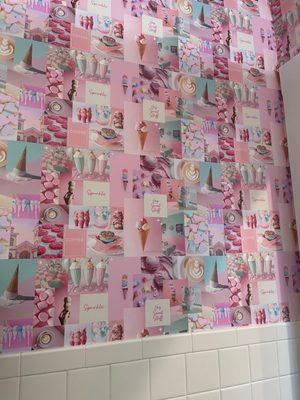 Checking out the bathroom wallpaper is a must!