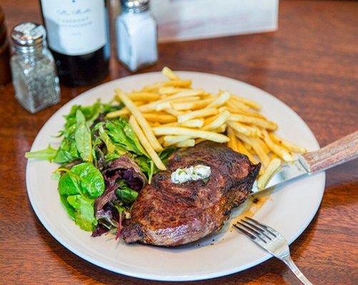 NY Steak Frite with shoe string fries and mesclun greens