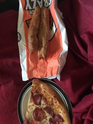 Photos of the Burnt Pizza I received, and the burnt breadsticks as well.