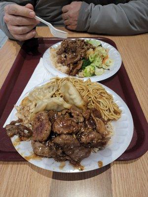 Beef teriyaki combo and beef teppan-yaki in the back.