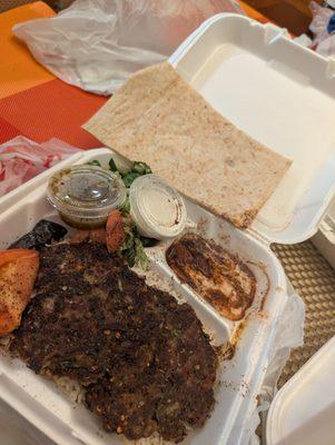 Ground beef patty meal, with hummus and naan