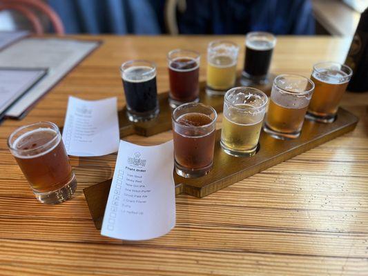 Beer flight of 8 and one brand new brew.