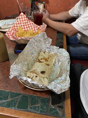 The table next to us had these incredibly large burritos They assured me they were delicious too.