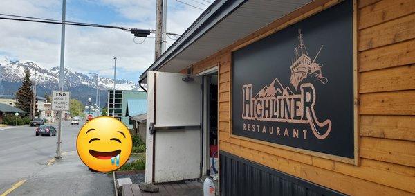 Sign to the left of the main door. "The Highliner Restaurant".