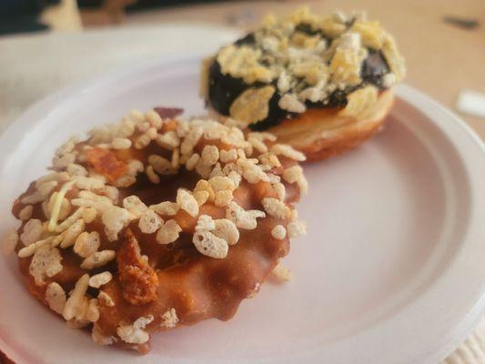 Maple with rice crispies and a croissant doughnut with chocolate and chips on top. Both were dry, tasted like they were left out.