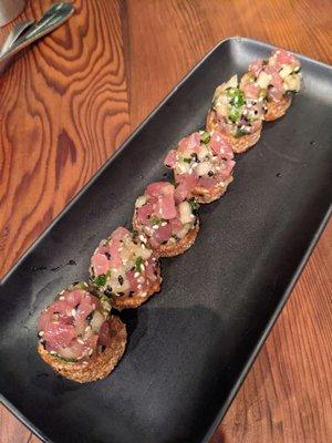 Ahi tuna tar tare on a freshly baked baguette slice