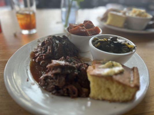 Brisket Basket with 2 sides. Greens and Sweet Potatoes.