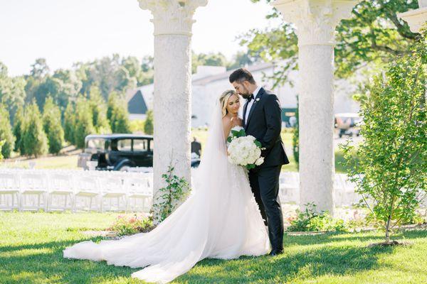 Their wedding ceremony was held under the arches at Howe Farms' Woodlands venue.