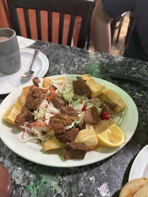 Plantain and beef with cabbage salad